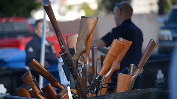 Not wanted ... a bin of rifles collected during the Los Angeles Police Department buy-back on Thursday, when hundreds of weapons were handed in.