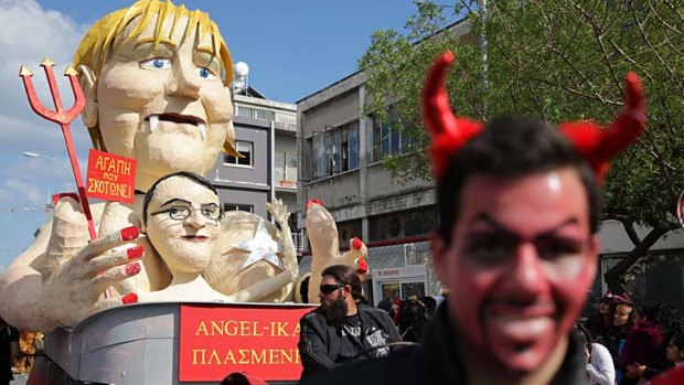 The devil in the detail: German Chancellor Angela Merkel and Cypriot.