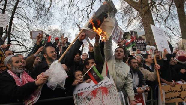 Demonstrators opposed to the regime of Libyan leader Muammar Gaddafi protest in London's Hyde Park.