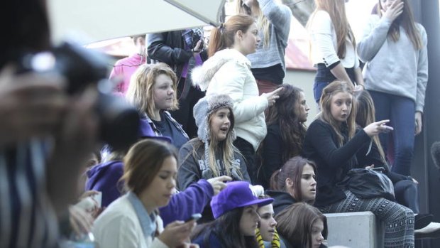 Bieber fever ... girls wait for the pop sensation outside The Star.