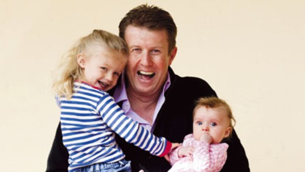 Peter Overton with his two girls Allegra and Giselle.