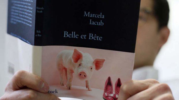 "Beauty and the Beast" or "Beautiful and Stupid")  ... either translation fits for Marcela Iacub's book about her relationship with Dominique Strauss-Kahn.