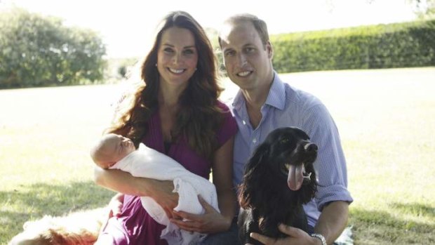 Happy family: William and Catherine with baby George in the first official photos of the new prince.