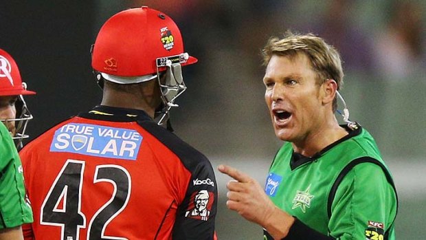 Fight night ... Marlon Samuels and Shane Warne square-up.