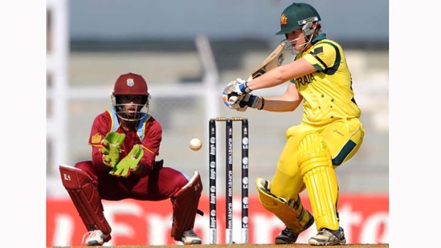 Australian Jess Cameron gets set to cut as West Indies wicket-keeper Merissa Aguilleria looks on.