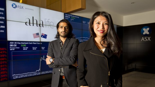 AHA Life founders Shauna Mei (right) and Sachin Devand (left) at listing ceremony for float of their company at the ASX. 