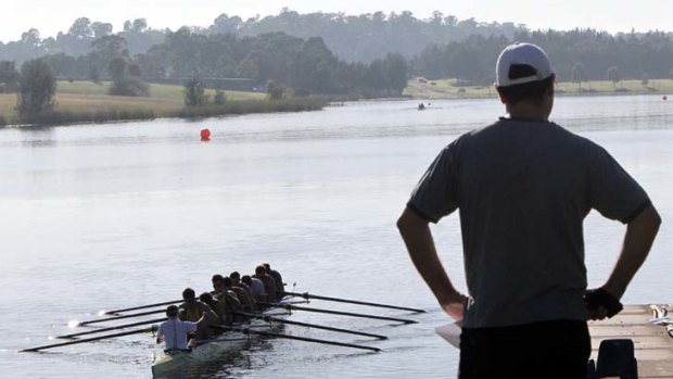 Putting their backs into it &#8230; rowers typically head out in the early morning as part of the national senior trials being held at Penrith.