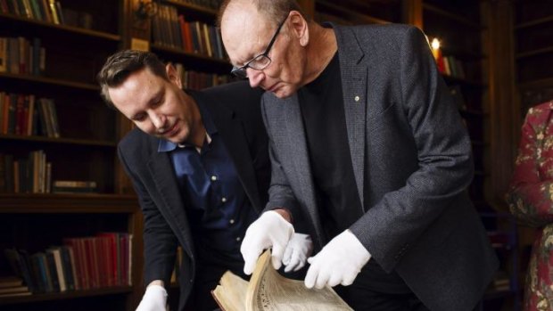 Taking a leaf out of the bard's book: John Bell and Peter Evans, of Bell Shakespeare looking at a 1893 edition of Shakespeare's poems and plays, in The Shakespeare Room at the Mitchell Library.  