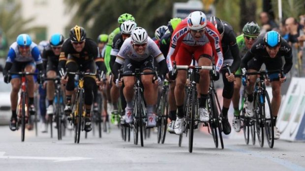 Norse code: Alexander Kristoff of Norway beats home a high-class field in the opening classic of the European season. 