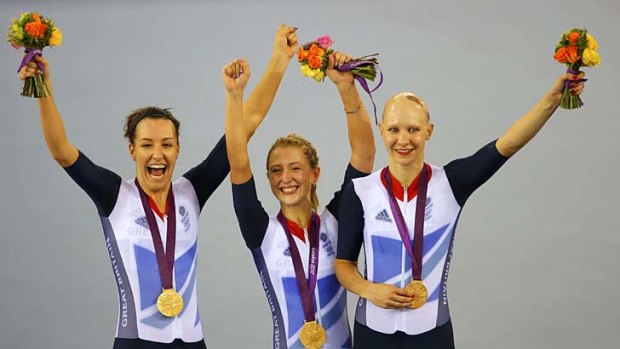 Record breakers ... ritain's Dani King, left, Laura Trott, centre, and Joanna Rowsell celebrate.