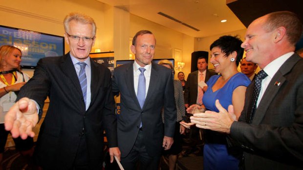 The LNP's Griffith candidate Bill Glasson supported at his launch by Prime Minister Tony Abbott, Premier Campbell Newman and his wife, Lisa Newman.