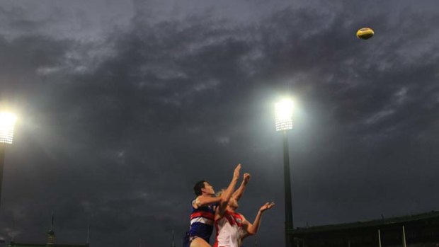 In the spotlight: Sydney's Lewis Roberts-Thomson flies for a mark during the Swans' easy win over the Western Bulldogs.