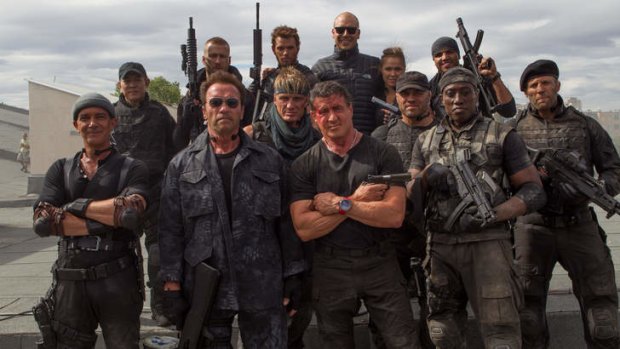 Australian director Patrick Hughes, back row at centre, with the cast of <i>Expendables 3</i>.