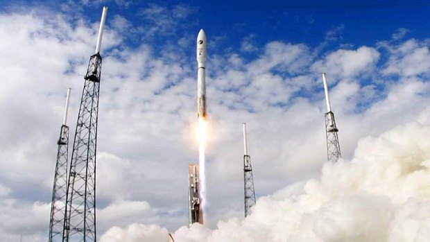 Blasting off ... a United Launch Alliance Atlas 5 rocket carrying the X-37B launches in Florida on Tuesday.