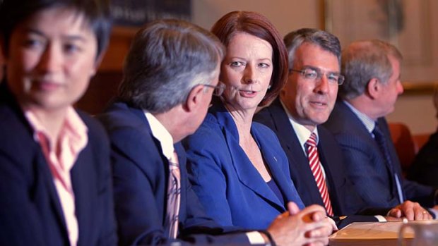 Prime Minister Julia Gillard during a cabinet meeting yesterday.