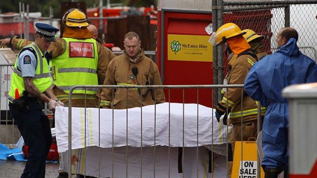 A body is removed from the scene of a fatal  explosion in the Auckland suburb of Onehunga.
