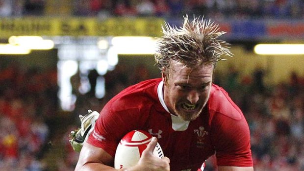 Andy Powell of Wales scores a try.