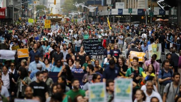 Finding voice: An estimated 300,000 people marched from Central Park in climate action.