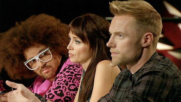 <i>The X Factor</i> judges Ronan Keating, far right, and Redfoo, far left, don't see eye to eye about mentoring styles.