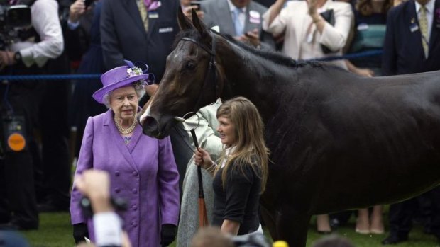 Cup runner: Queen Elizabeth with Estimate after it won the Gold Cup at Ascot last year.