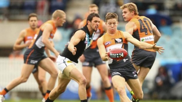 Time served: Giant Toby Greene in action against Port Adelaide. 