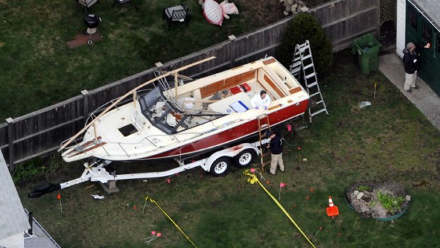 Crime scene: Dave Henneberry's boat in the backyard of his Boston home.