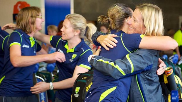 Parting &#8230; Cathryn Fitzpatrick, right, farewells her players at Melbourne.
