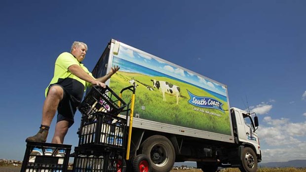Milko on the move ... Tony Fisher delivers fresh south coast milk to Aish's Seafood and Takeaway at Berkeley, south of Wollongong.