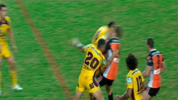 Ben Te'o launches a shoulder charge at Matt Groat of the Wests Tigers on Friday.