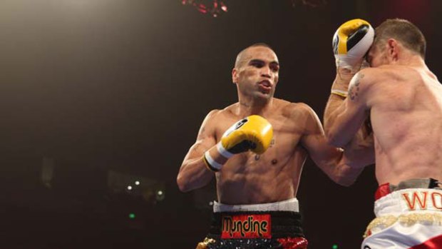 Anthony Mundine and Garth Wood during their bout.