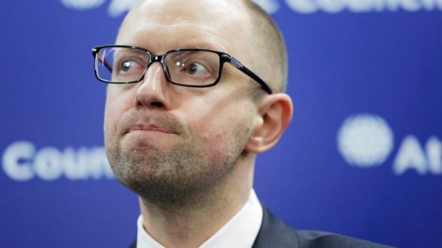 Ukraine Prime Minister Arseniy Yatsenyuk is mobilising a volunteer force of 60,000 soldiers to protect the Crimea border that Russian forces have reinforced.