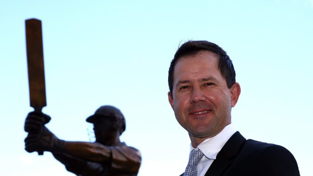 Immortal: Ricky Ponting poses with his statue at Blundstone Arena.