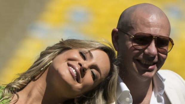 Claudia Leitte and Pitbull perform the World Cup song with Jennifer Lopez.