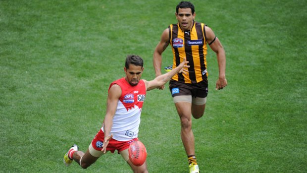 Defining moment: Lewis Jetta out-runs Cyril Rioli.