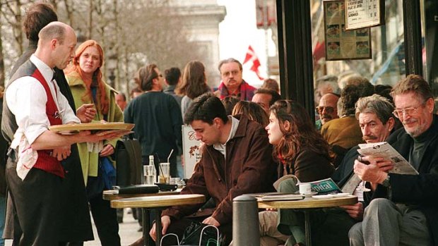 Don't get distracted: Tourists should remain alert even while having a drink at a cafe.