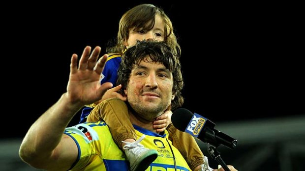 Grand finale &#8230; an emotional Nathan Hindmarsh, with his son Rowdy, didn't get the send-off he wanted but made it his own with a late penalty goal.