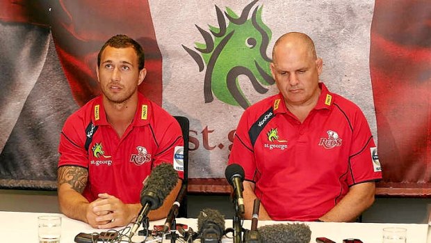 Quade Cooper and Queensland Reds coach Ewen McKenzie at Friday's announcement that the star five-eighth will remain in Australian rugby.