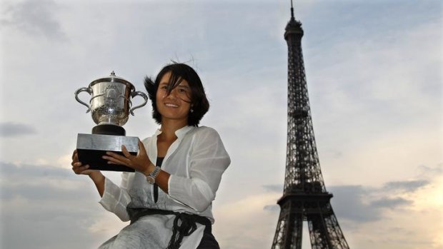 French success ... Li Na poses with her trophy near the Eiffel Tower in Paris.