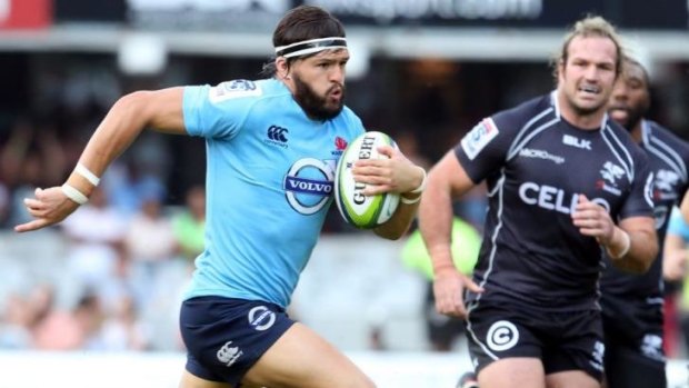 Early highlight: Adam Ashley-Cooper makes a bust for the Waratahs.