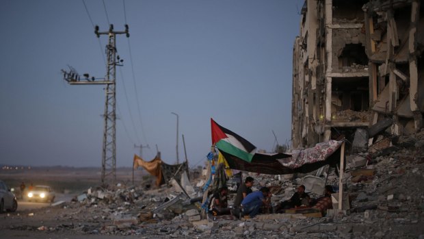 Palestinians in a tent outside apartments in the town of Beit Lahiya in the northern Gaza strip.
