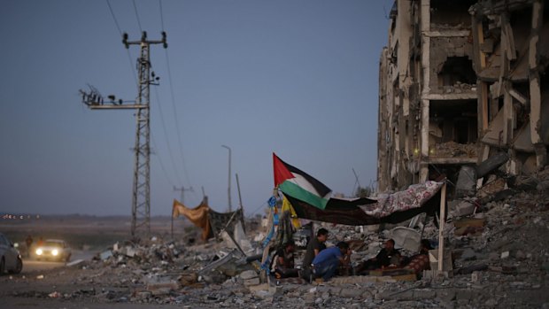 Palestinians in a tent outside apartments in the town of Beit Lahiya in the northern Gaza strip.