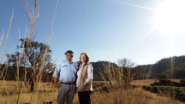 "This is our land people are making all this money on" ... Ted Hewitt with his wife Di on their property near Denman.