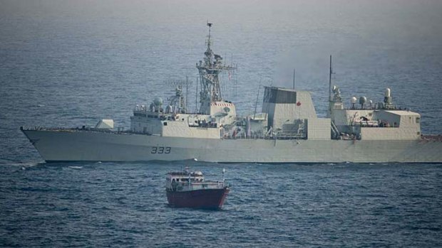 On alert: HMCS Toronto, part of an Australian-led taskforce, intercepted a small vessel suspected of drug smuggling.
