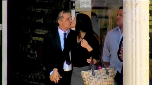 Denies charges: Simon Gittany, who is accused of murdering his fiancee Lisa Harnum, seen kissing his new girlfriend Rachell Louise.