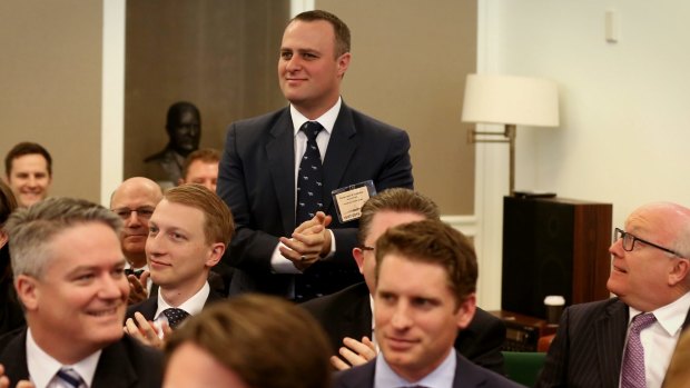The incoming Member for Goldstein, Tim Wilson is welcomed during a joint party room meeting at Parliament House on Monday.