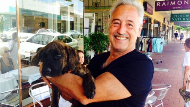 French chef Alain Fabregues, who has a formidable reputation in Perth, with his puppy Brutus