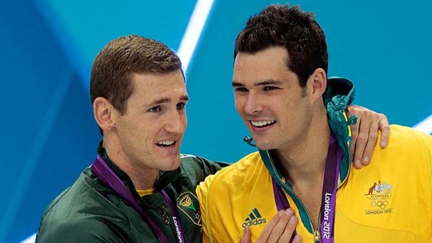 Controversy ... Gold medallist Cameron van der Burgh, left, used illegal dolphin kicks in his win over Christian Sprenger.