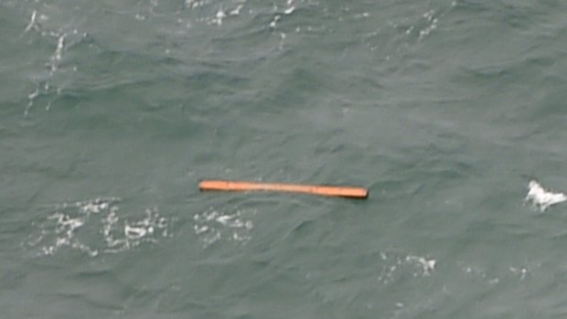 An aerial view from an Indonesian search and rescue aircraft over the Java Sea shows floating debris.