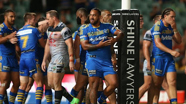 Rejoicing: Kenny Edwards celebrates after scoring a try.