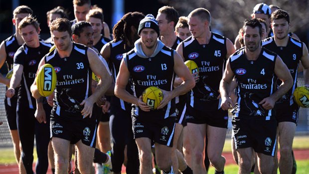 No supplements: the Collingwood squad goes through its paces in the lead-up to the Bombers clash.